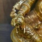 24K gold plated Dzambhala (Jambhala) statue, 22cm tall, handcrafted Buddhist wealth deity with intricate detailing, blue facial highlights, and ornate lotus pedestal base.