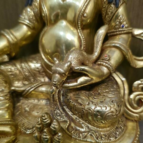 24K gold plated Dzambhala (Jambhala) statue, 22cm tall, handcrafted Buddhist wealth deity with intricate detailing, blue facial highlights, and ornate lotus pedestal base.