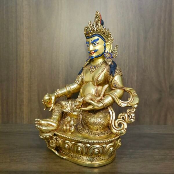 24K gold plated Dzambhala (Jambhala) statue, 22cm tall, handcrafted Buddhist wealth deity with intricate detailing, blue facial highlights, and ornate lotus pedestal base.