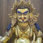 Dzambhala (Jambhala) statue—24K gold-plated copper, gold-powder painted face; 47×40 cm, ~14 kg; gemstone inlay with mongoose & wealth fruit.