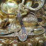 Dzambhala (Jambhala) statue—24K gold-plated copper, gold-powder painted face; 47×40 cm, ~14 kg; gemstone inlay with mongoose & wealth fruit.