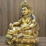 Dzambhala (Jambhala) statue—24K gold-plated copper, gold-powder painted face; 47×40 cm, ~14 kg; gemstone inlay with mongoose & wealth fruit.