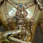 Vajrasattva (Dorje Sempa) statue—24K gold-plated copper with gold-powder painted face, holding vajra & bell; handmade in Nepal; size H24 × W17 cm; weight 1.62 kg.