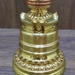 Close-up of lotus base on gold plated stupa chorten, copper craftsmanship
