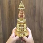 Hand-held size reference photo of gold plated Tibetan stupa chorten, 23cm