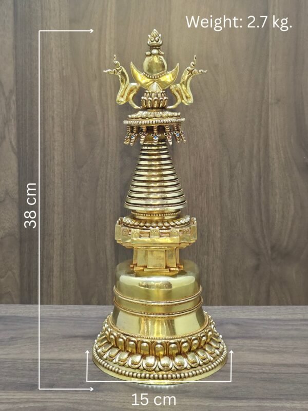 Gold plated copper Tibetan style Buddhist stupa with size overlay showing 38 cm height, 15 cm width, and 2.7 kg weight.