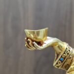 Close-up view of the Kapala (skull cup), held in the hand of the of the Yeshe Tsogyal statue.