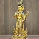 Right side angle of 24K gold plated Mandarava statue.