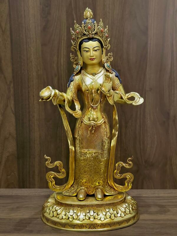 Full front view of Yeshe Tsogyal statue on lotus base holding a shallow ritual cup.