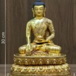 Shakyamuni Buddha gold plated copper statue with measurements — 30cm tall, 24.5cm wide, weighing 3.19kg, handcrafted in Kathmandu Nepal.