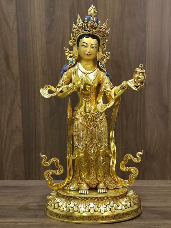 Full front view of Mandarava statue on lotus base holding a ritual vase.